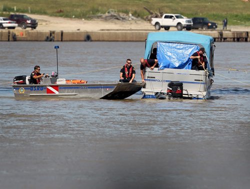 River patrols continue searching just north of the Provencher Bridge Saturday after he went missing in the Red River on Friday afternoon near the Provencher Bridge.   Aug 13, 2014 Ruth Bonneville / Winnipeg Free Press