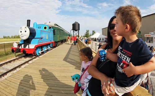 Jenna looks at her son, Liam, 4, as he is stunned into silence when Thomas the Tank Engine pulls into The Prairie Dog Central Railway Sunday morning.  140817 August 17, 2014 Mike Deal / Winnipeg Free Press