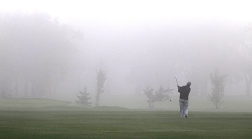 It was a foggy start for the golf game Tuesday morning at the Kildonan Park Golf Course. weather story Wayne Glowacki/Winnipeg Free Press August 19 2014