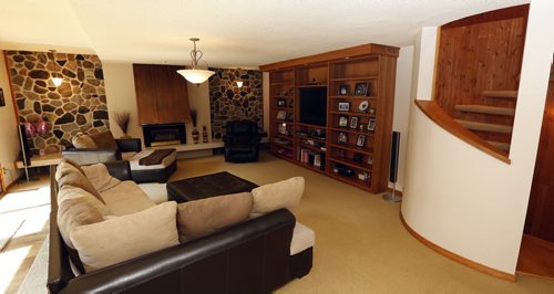 RE Sale HOMES .family room  3196 Henderson Hwy  for todd lewys story Aug 19 2014 / KEN GIGLIOTTI / WINNIPEG FREE PRESS