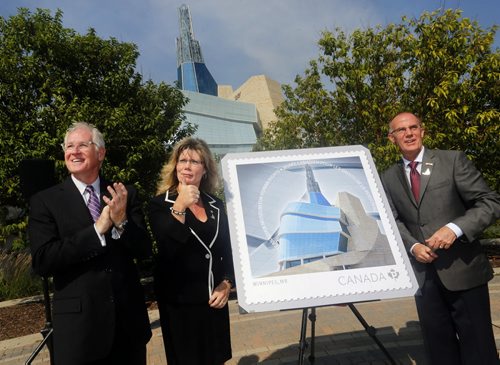 LOCAL - Canadian Museum for Human Rights stamp Thumbs Up Äì LtoR Stuart Murray President and CEO of the Canadian Museum for Human Rights with  Minister Shelly Glover ,  with  Rights Bill Davidson, Vice-President, Engineering and Postal Transformation, Canada Post Canadian unveil stamp commemorating  the Canadian Museum for Human Rights OTTAWA, Aug. 18, 2014 /CNW/ - On Wednesday, August 20, the Honourable Shelly Glover, Minister of Canadian Heritage and Official Languages, Stuart Murray, President and CEO of the Canadian Museum for Human Rights and Bill Davidson, Vice-President, Engineering and Postal Transformation at Canada Post will unveil the new stamp celebrating the opening of the new Canadian Museum for Human Rights. Unveiling of the Canadian Museum for Human Rights stamp, celebrating the opening of the new museum in September 2014 ,Honourable Shelly Glover, Minister of Canadian Heritage and Official Languages .Stuart Murray, President and CEO, Canadian Museum for Human Rights Bill Davidson, Vice-President, Engineering and Postal Transformation, Canada Post Canadian Museum for Human Rights Winnipeg, Manitoba Aug 20 2014 / KEN GIGLIOTTI / WINNIPEG FREE PRESS