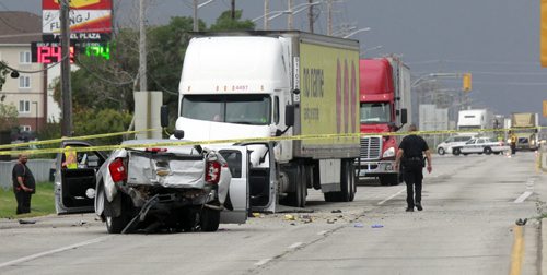 A crash on the Trans Canada Highway at the intersection of Race Track Rd. Thursday morning has closed the east bound lanes. Winnipeg Police on scene directing traffic. Wayne Glowacki/Winnipeg Free Press August 21 2014