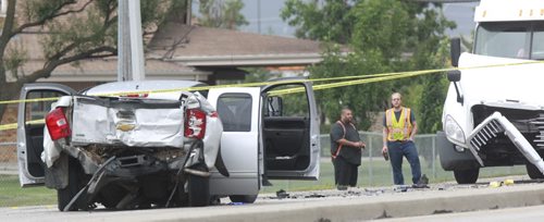 A crash on the Trans Canada Highway at the intersection of Race Track Rd. Thursday morning has closed the east bound lanes. Winnipeg Police were on the scene directing traffic. Wayne Glowacki/Winnipeg Free Press August 21 2014