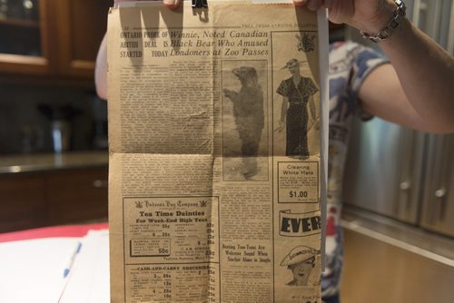 Brenda Maycher holds a Winnipeg Free Press clipping of   the inspiration for Winnie the Pooh which her grandfather Harry Colebourn had owned and eventually donated him to the London Zoo. Sarah Taylor / Winnipeg Free Press August 21, 2014