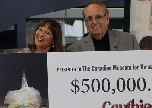LOCAL STDUP - Jim Gauthier  of Jim Gauthier Auto Group donates $500,000 to the Canadian Museum for Human Rights ,this is his second donation , the first was for $1,000,000. Gail Asper  received  the donation .  Aug 25 2014 / KEN GIGLIOTTI / WINNIPEG FREE PRESS
