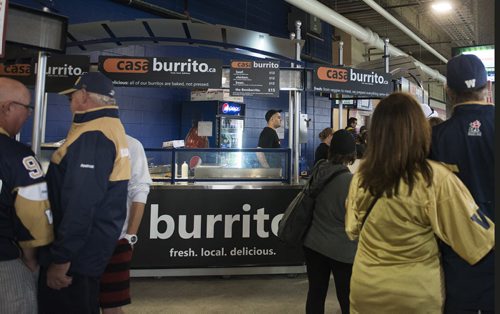 Casa Burrito vendor in Investors Group Field stadium. Sarah Taylor / Winnipeg Free Press August 22, 2014. Romona Goomansingh's story