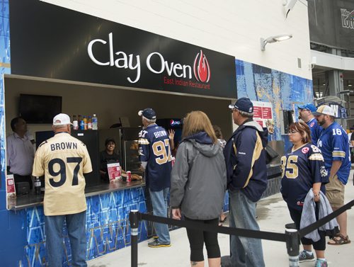 Clay Oven vendor in Investors Group Field stadium. Sarah Taylor / Winnipeg Free Press August 22, 2014. Romona Goomansingh's story