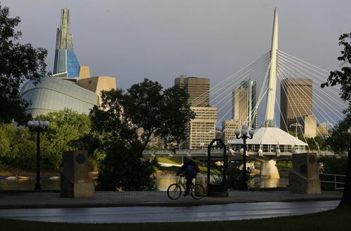 Stdup Weather . Skyline symbols  of Winnipeg , the Riel Esplanade  and the Canadian Museum for Human Rights bathed in a bright sunrise will bring cool sunny temps of 17 degrees with 29 for Thursday . Aug 26 2014 / KEN GIGLIOTTI / WINNIPEG FREE PRESS