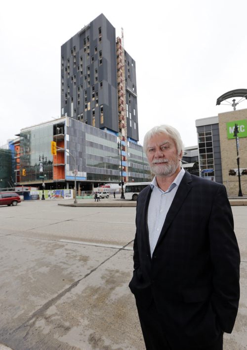 biz - ROSS MCGOWAN . at 311 Portage , CentreVenture at the corner of Portage Avenue and Donald Street. CentreVenture Development Corp. president and CEO ROSS MCGOWAN at the site of one of arguably the cityÄôs its highest-profile downtown redevelopment project, which includes a new office building, hotel, condominium tower and multi-level  parkade. SECTION: Business/McNeill  Aug 26 2014 / KEN GIGLIOTTI / WINNIPEG FREE PRESS