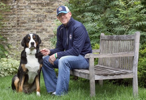 Mike Keane - Assistant Coordinator of Player Development for the Winnipeg Jets at his home with his Greater Swiss Mountain dog named Hank-See Tim Campbell story- Aug 26, 2014   (JOE BRYKSA / WINNIPEG FREE PRESS)