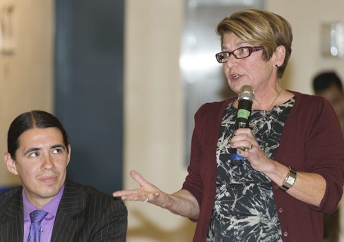 Judy Wasylycia-Leis speaks at Sisler High School Tuesday night as Manitoba Filipino Business Council confirms eight out of nine mayoral candidates. Sarah Taylor / Winnipeg Free Press August 26, 2014