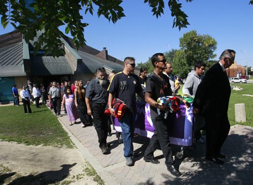 The procession from Thunderbird House to the hearse Wednesday after the funeral for Faron Hall. Gord Sinclair story. Wayne Glowacki/Winnipeg Free Press August 27 2014