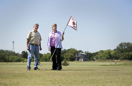 Jerry (left) and Juanita Cousins started building their golf course in 2008 on their 65 acres property in Whitemouth. Although the two aren't avid golfers they enjoy playing on their quieter and less competitive course. Sarah Taylor / Winnipeg Free Press August 27, 2014 Bill Redekop story