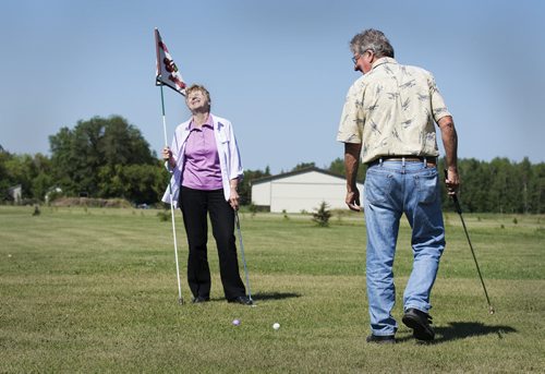 Jerry (right) and Juanita Cousins started building their golf course in 2008 on their 65 acre property in Whitemouth. Although the two aren't avid golfers they enjoy playing on their quieter and less competitive course. Sarah Taylor / Winnipeg Free Press August 27, 2014 Bill Redekop story