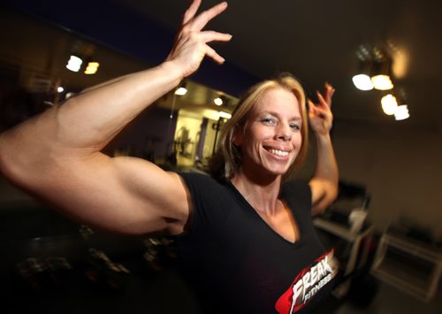 A new reality show about bodybuilders will be filmed in Winnipeg this fall. The show is currently casting contestants. Trina Burns is set to be one of the contestants on the show. She's flexing at a locla gym for the shoot. See Shamona Harnett story.  August 27, 2014 - (Phil Hossack / Winnipeg Free Press)