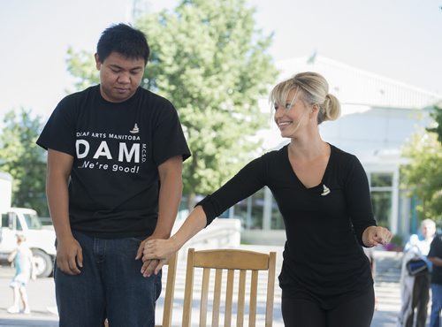 Christopher De Guzman and Joanna Hawkins of One Hundred Decibels give a preview performance at the Forks on Thursday of what's to coming at the opening weekend of the Canadian Museum of Human Rights on September 20th, 21st. Sarah Taylor / Winnipeg Free Press August 28, 2014