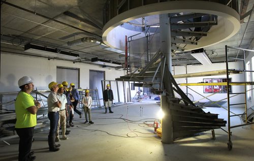 The tour of Amber Trails Community School, 1575 Templeton Ave., the new school is currently under construction.  At left,  Site Superintendent Tim Doherty gives tour to group including Education and Advanced Learning Minister James Allum. This is the spiral staircase in library.   Nick Martin's start of school package. Wayne Glowacki/Winnipeg Free Press August 28 2014