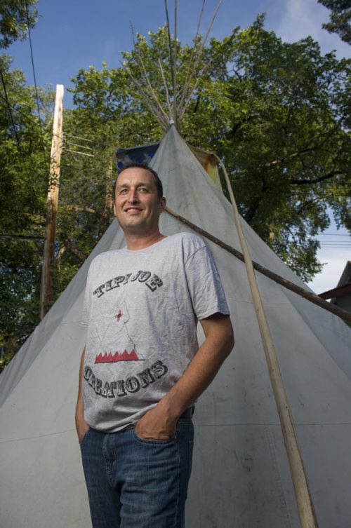 140828 Winnipeg - DAVID LIPNOWSKI / WINNIPEG FREE PRESS  Joe Lanceley also known as Tipi Joe rents and builds tipis. He is pictured with one of his Tipis in his backyard Thursday August 28, 2014.   49.8 INTERSECTION -