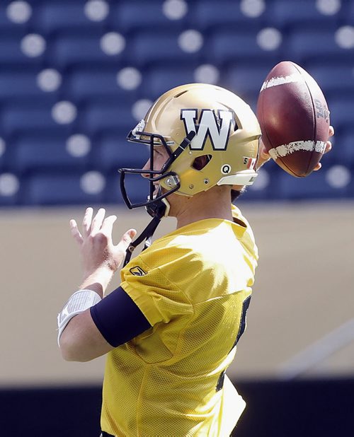 QB Drew Willy took most of the reps and throwing the ball with the hand he injured Thursday with no problems .Lightning nearly prevented the Bombers from getting a walk through before leaving for Sunday's Game in Saskatchewan  , eventually the sun came out  and the players went through a light workout before busing it to out. Aug 29 2014 / KEN GIGLIOTTI / WINNIPEG FREE PRESS