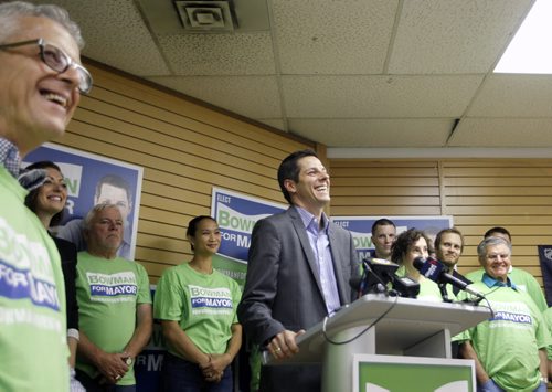 Mayoral candidate Brian Bowman and supporters at a briefing for media in his campaign office on Portage Ave. Friday morning. Bart Kives story. Wayne Glowacki/Winnipeg Free Press August 29 2014