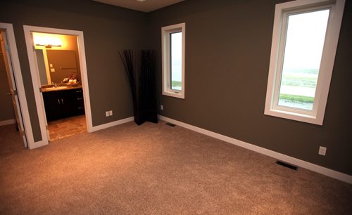 New home in Niverville at 96 Claremont Master bedroom w/ensuite....not staged sorry. (Photo by realtor Renee Dewar) August 29, 2014 - (Phil Hossack / Winnipeg Free Press)