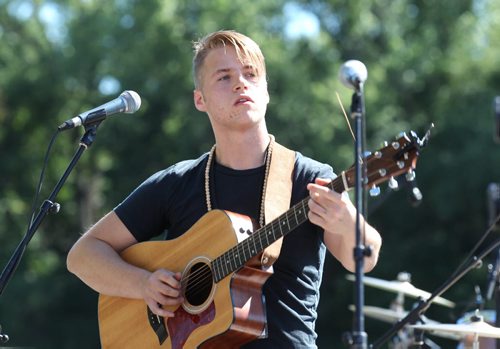 Keiffer McLean performs  on the waterfront at the Forks Saturday during the PRAIRIE BARGE FESTIVAL - Manitoba and Saskatchewan artists team up for three days of music, art and culture showcasing the diverse talent of the Prairies.      Aug 30, 2014 Ruth Bonneville / Winnipeg Free Press   Ruth Bonnevilles