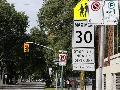 LOCAL - New school zones around Winnipeg resulted in police issuing 128 tickets Tuesday along with 173 warnings.   SEPT  2 2014 / KEN GIGLIOTTI / WINNIPEG FREE PRESS
