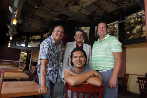 Adam Beach (front), Jim Compton, Jeremy Torrie, and Furlon Barker of South Beach Casino. The old Ellice Cafe was bought by the agoriginal group. On occasion of receiving $50,000 donation from South Beach Casino for Adam Beach Film institute. BORIS MINKEVICH / WINNIPEG FREE PRESS  Sept. 2, 2014