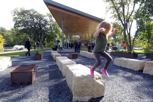 Opening of the St. Vital Park Duck Pond Pavilion and Écobuage public art project. Hadley Cooke ,4, plays on the structure. BORIS MINKEVICH / WINNIPEG FREE PRESS  Sept. 2, 2014
