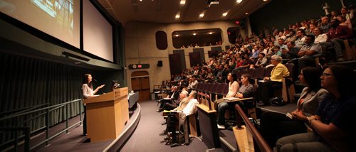 A crowded theater at the U of M medical school listens to Heidi Wood of the National Microbiology Lab (?) relate her recent experiences in the field fighting Ebola. Bart Kives story. Sept, 2, 2014- (Phil Hossack / Winnipeg Free Press)