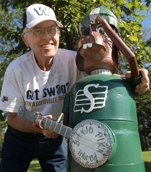 76 yr old Tom Burns, who lives on Roblin Blvd has made this special statue a few years back for Banjo Bowl weekend in Winnipeg  He sent a few to Saskatchewan and is very looking forward to this weekends rematch between the Winnipeg Blue Bombers and the Saskatchewan Roughriders- Standup Photo- Sept 03, 2014   (JOE BRYKSA / WINNIPEG FREE PRESS)