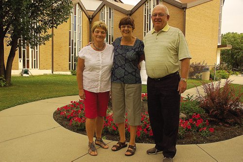 Canstar Community News Aug. 14/14 - Kathy Sangster of John Black Memorial United Church, Diana Tardi of St. Alphonsus Roman Catholic Church and Campbell McIntyre of St. Saviour Anglican Church are planning a tri-ecumenical service between the three parishes on Aug. 27. (DAN FALLOON/CANSTAR COMMUNITY NEWS/HERALD)