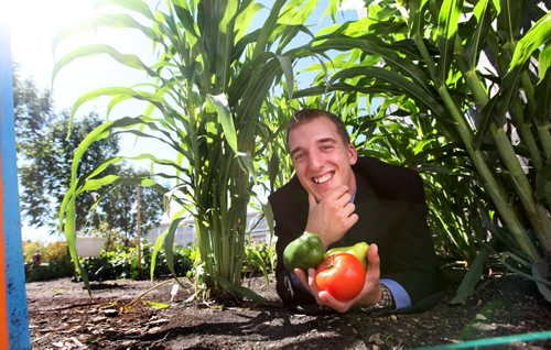David Gingera runs a new company called CitiGrow, which installs urban gardens at businesses and other properties around town.  Photographs taken in the front garden at The Inn of The Forks which has a large garden with corn, asparagus, broccoli, carrots, cabbage and herbs which supplies the restaurant with fresh, local food.   See Geoff Kirbyson's story.  Sept 03.  2014 Ruth Bonneville / Winnipeg Free Press   Ruth Bonnevilles