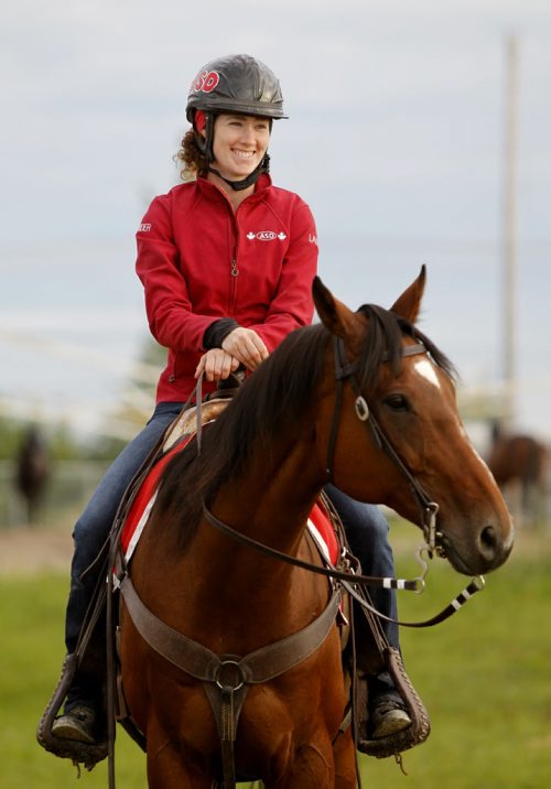 Laura McIvor,  Assiniboia Downs outrider on the practice track Thursday morning.  For George Williams horse racing column. Wayne Glowacki/Winnipeg Free Press Sept.4 2014