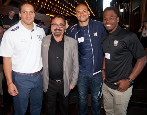 Current and former Winnipeg Blue Bombers players came out to support Variety, the Childrens Charity at the Hearts of Blue and Gold Dinner at Earls St. Vital. More than $22,000 was raised. The next dinner is Oct. 28 at Earls on Main Street. Pictured, from left, are Bombers player Julian Feoli-Gudino, Variety CEO Jerry Maslowsky, and Bombers players Nick Moore and Chris Randle. (John Johnston / Winnipeg Free Press)