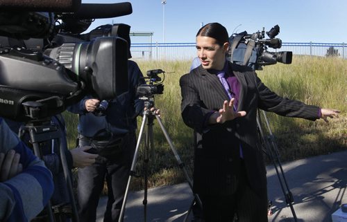 Mayoral candidate Robert-Falcon Ouellette chats with media prior to his transit transformation announcement near the location of the Jubilee Station (south end of Argue Street near Jubilee). Wayne Glowacki/Winnipeg Free Press Sept.5 2014