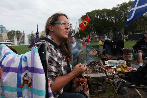 Chelsea Cardinal,  a spokesperson for the campers at Memorial Blvd. talks with reporter Saturday.  BREAKING CAMP at Memorial Park Saturday after many days of protesting for an inquiry into missing and murdered aboriginal women.  The camp that was set up in Memorial Park on Aug 22nd will be dismantled Saturday with a feast offering in the evening.  See Mary Agnes Story.  Sept 04.  2014 Ruth Bonneville / Winnipeg Free Press   Ruth Bonnevilles