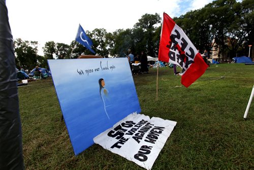 A painting created by one of the protestors camping at Memorial Park pays tribute to aboriginal woman as it sits at the edge of camp. The camp that was set up in Memorial Park on Aug 22nd will be dismantled Saturday with a feast offering in the evening.  See Mary Agnes Story.  Sept 04.  2014 Ruth Bonneville / Winnipeg Free Press   Ruth Bonnevilles
