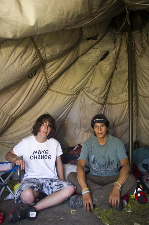 140907 Winnipeg - DAVID LIPNOWSKI / WINNIPEG FREE PRESS  Tyler Frederick (left, 19) and Frank Hudson (21) are still living in tents in Memorial Park as part of a protest for an inquiry into missing and murdered Aboriginal Woman, Sunday afternoon.
