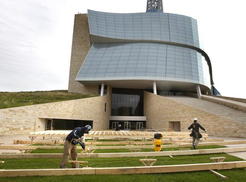 Construction of the risers for guests attending the official opening ceremonies taking place Friday, September 19 at the front of the group entrance of the Canadian Museum For Human Rights.   Wayne Glowacki/Winnipeg Free Press Sept.9 2014