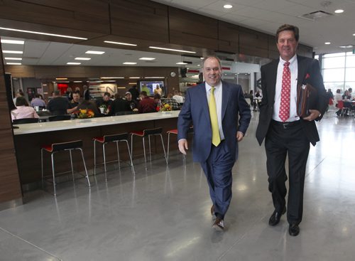 CN President and CEO CLAUDE MONGEAU,left, and James OConnor   arrive at the grand opening of the railways new state-of-the-art Winnipeg training campus. When it was announced two years ago, the railway said the new 100,000-square-foot facility would be equipped to handle 250 to 300 trainees per week.-See Murray McNiel story- Sept 09, 2014   (JOE BRYKSA / WINNIPEG FREE PRESS)