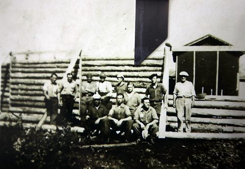 Second world war German POW Richard Beranek fposes (under the grey arrow alone in the middle row to the right) in one of the Canadian POW camps he was held in.  See Bill Redekop story re his family following his trail here in Canada.  September 9,2014 - (Phil Hossack / Winnipeg Free Press)