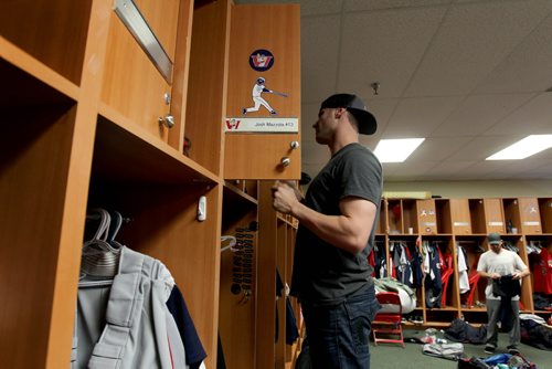 Goldeyes #13 Josh Mazzola packs his bags along with the rest of the team Wednesday after season ends. See Melissa Martin story.   Sept 10.  2014 Ruth Bonneville / Winnipeg Free Press   Ruth Bonnevilles