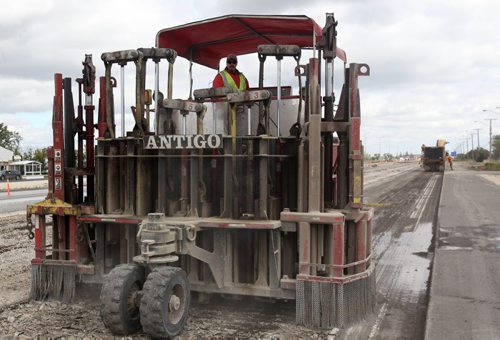 Machine called a Rubbleizer works on Portage Ave in Headingley, Manitoba-The machine crushes old roads so concrete can be hauled away to later be recycled as fill for new roads-See Dan Lett story- Sept 11, 2014   (JOE BRYKSA / WINNIPEG FREE PRESS)