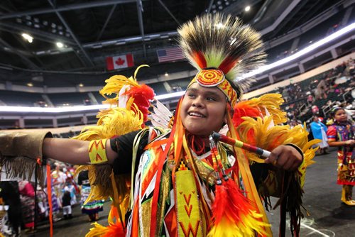 Fifteen-year-old Jonathan Sampson from Auburn Washington competes in the Manito Ahbee dance competition wearing a traditional costume among hundreds of other Indigenous dancers at MTS Centre Saturday.   Sept 13,  2014 Ruth Bonneville / Winnipeg Free Press