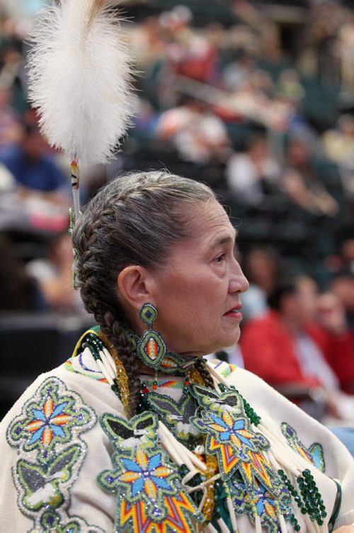 Elder Shannon Roberts from Oklahoma wears her traditional dress   while attending Manito Ahbee dance competition  MTS Centre Saturday.  Sept 13,  2014 Ruth Bonneville / Winnipeg Free Press