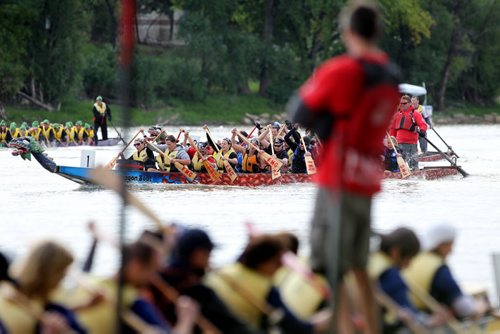Dragon Boat teams fight to be the first to cross the finishline  at the FMG annual Manitoba Dragon Boat Races Saturday at the Forks.  Funds raised go to CancerCare Manitoba. Standup Sept 13,  2014 Ruth Bonneville / Winnipeg Free Press
