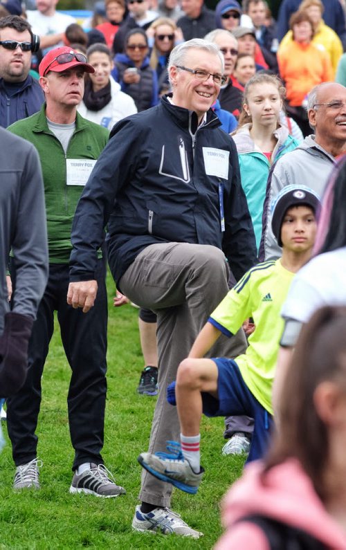 Premier Greg Selinger and hundreds of other participants in the Terry Fox Run warm up prior to the race in Assiniboine Park Sunday morning.  140914 September 14, 2014 Mike Deal / Winnipeg Free Press