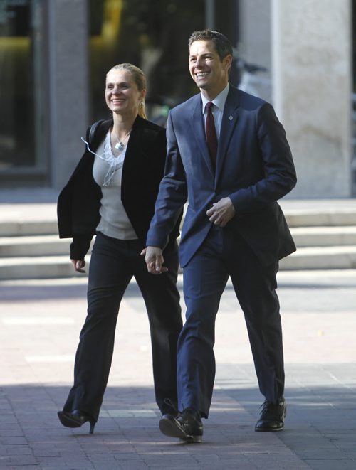 Brian Bowman and  wife Tracy walk to the City Clerk's office Monday so Brian can  file his mayoral nomination papers.   Wayne Glowacki/Winnipeg Free Press Sept.15  2014