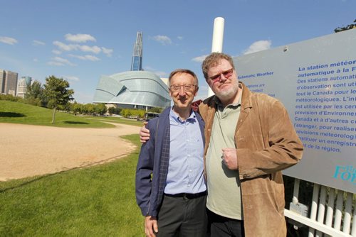 Dale Marciski from Environment Canada is retiring this month. Here he poses at The Forks with Doug Speirs. BORIS MINKEVICH / WINNIPEG FREE PRESS  Sept. 15, 2014